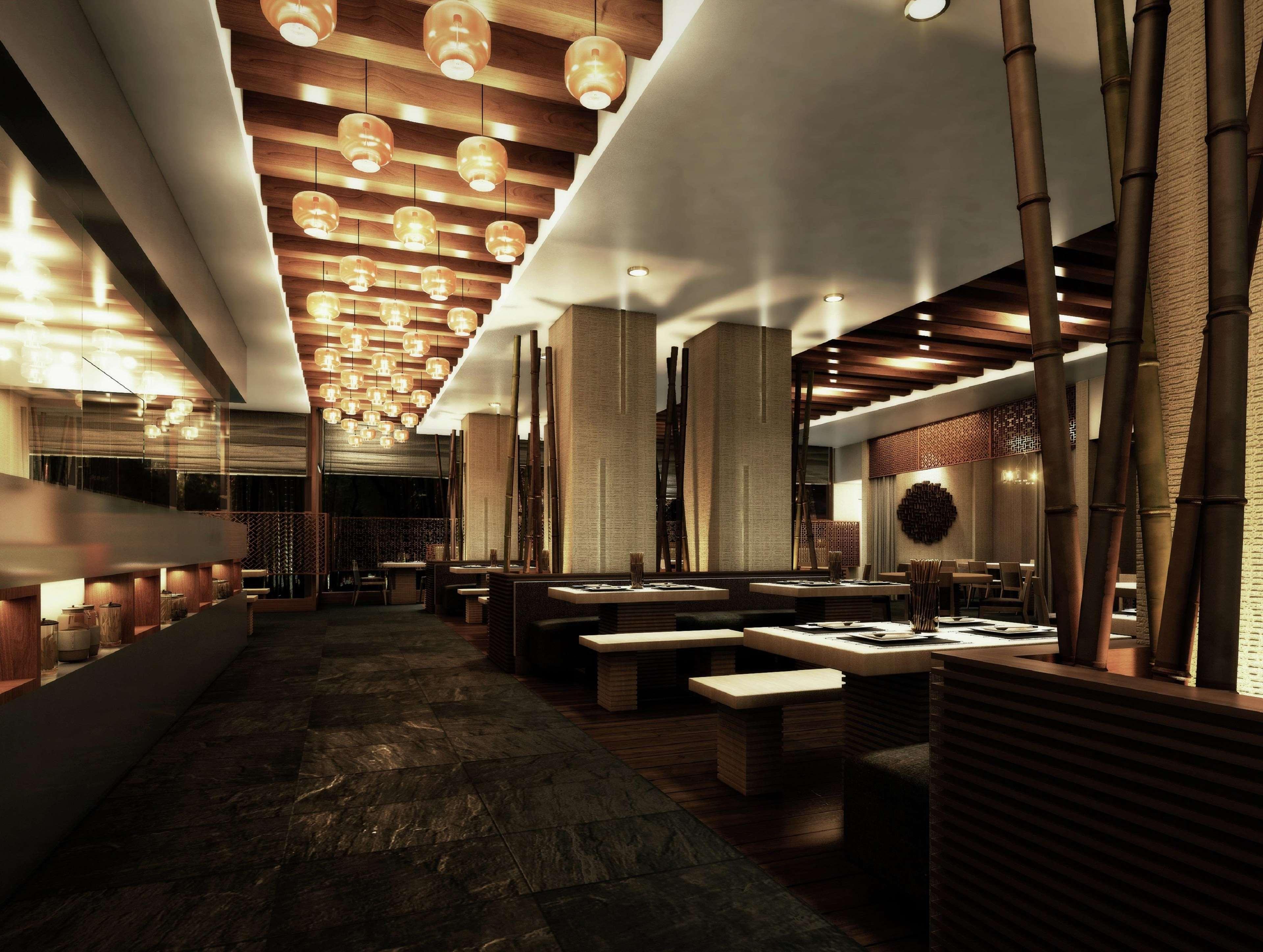 Doubletree By Hilton Doha - Al Sadd Hotel Buitenkant foto Interior of a restaurant